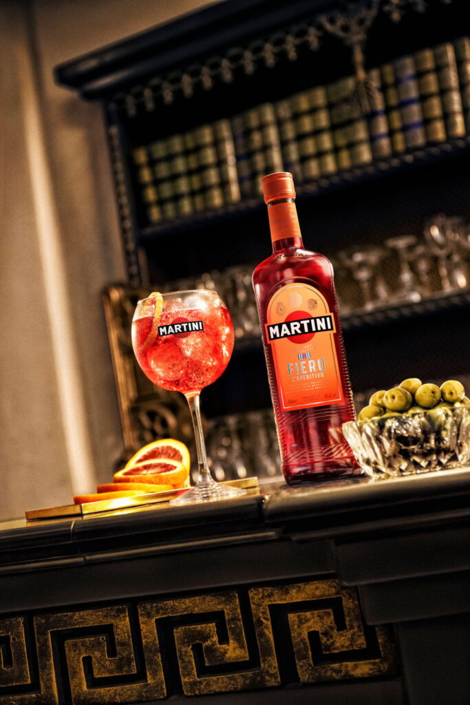 Key ingredients laid out and with a glass of spritz